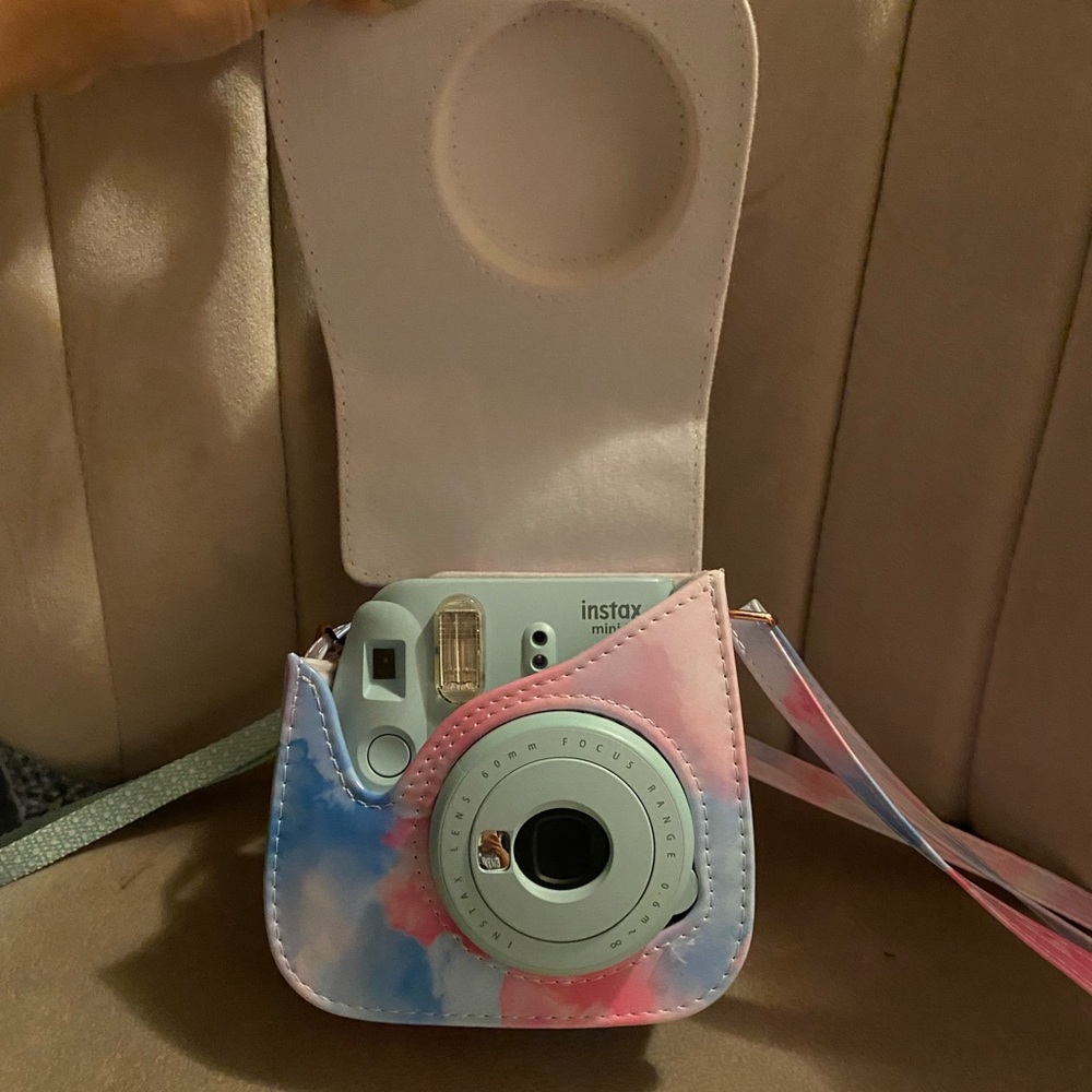 Instax mini 9 with tie die case and a lense